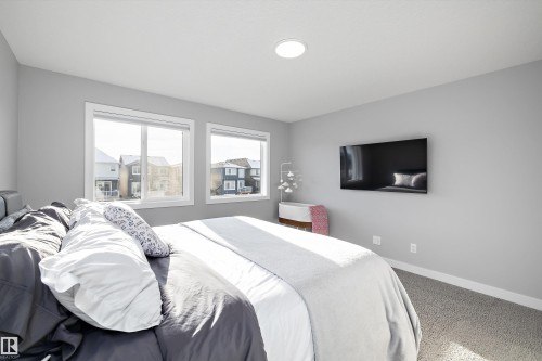 7027 54 Avenue, Beaumont, AB - Indoor Photo Showing Bedroom