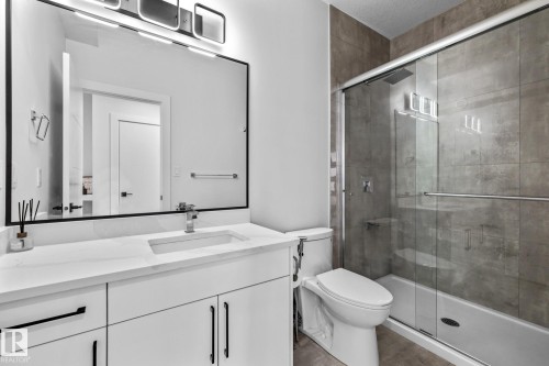 Full bath featuring vanity and a stall shower - 5304 Kimball Place, Edmonton, AB - Indoor Photo Showing Bathroom