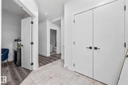 Entrance featuring recessed lighting, a closet, and light tile patterned floors - 5304 Kimball Place, Edmonton, AB - Indoor Photo Showing Other Room