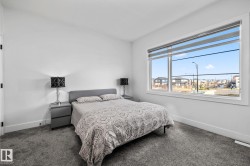 Bedroom with carpet and baseboards - 