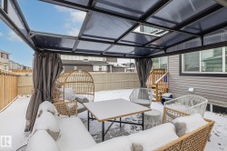 Fenced backyard featuring an outdoor hangout area and a patio area - 