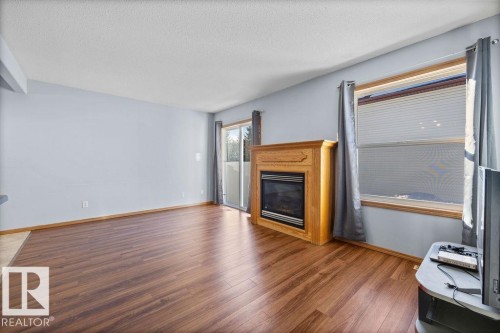 84 16823 84 Street, Edmonton, AB - Indoor Photo Showing Living Room With Fireplace