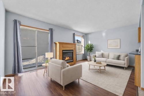 84 16823 84 Street, Edmonton, AB - Indoor Photo Showing Living Room With Fireplace