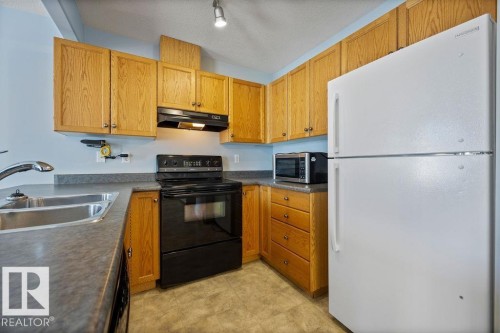 84 16823 84 Street, Edmonton, AB - Indoor Photo Showing Kitchen With Double Sink