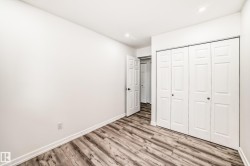 Unfurnished bedroom featuring light wood finished floors, a closet, and recessed lighting - 