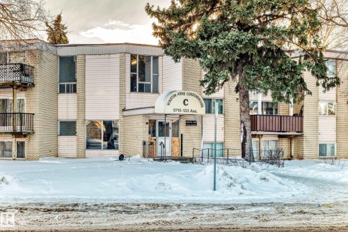 Snow covered building with a view of apartment building / complex - 4B 13230 Fort Road, Edmonton, AB - Outdoor