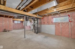 Below grade area with plenty of natural light and heating unit - 