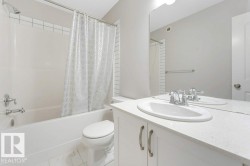 Full bath featuring vanity and shower / bathtub combination with curtain - 