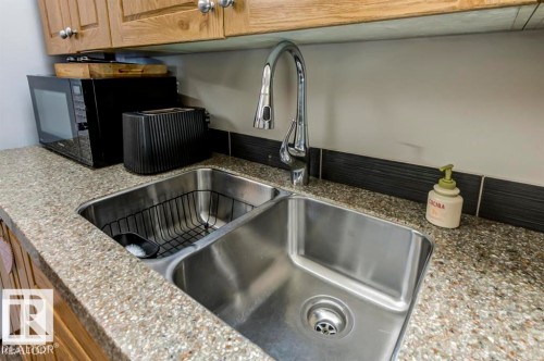 2346 151 Avenue, Edmonton, AB - Indoor Photo Showing Kitchen With Double Sink