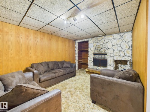 352 Huffman Crescent, Edmonton, AB - Indoor Photo Showing Living Room With Fireplace