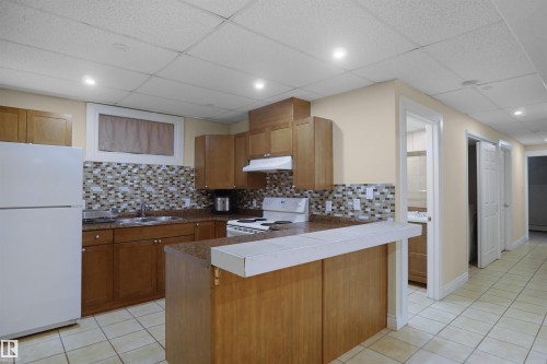 12411 132 Avenue, Edmonton, AB - Indoor Photo Showing Kitchen With Double Sink