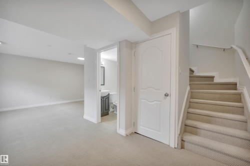 Staircase featuring carpet flooring - 457 Aster Close, Leduc, AB - Indoor Photo Showing Other Room