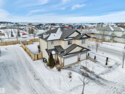 Snowy aerial view featuring a residential view - 