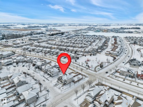 Aerial overview of property's location featuring nearby suburban area - 457 Aster Close, Leduc, AB - Outdoor With View