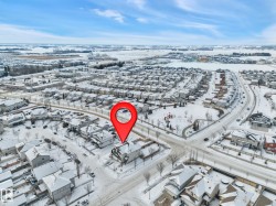 Aerial overview of property's location featuring nearby suburban area - 