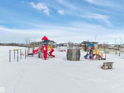 Snow covered playground featuring a playground - 