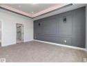 Unfurnished room with a raised ceiling and light colored carpet - 138 South Ravines Drive, Devon, AB  - Indoor Photo Showing Other Room 