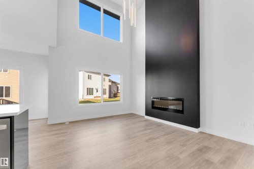 911 18 Avenue, Edmonton, AB - Indoor Photo Showing Living Room With Fireplace