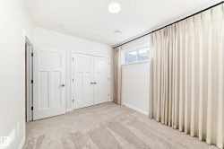 Unfurnished bedroom with carpet flooring and a closet - 