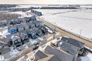 Snowy aerial view with a residential view - 3249 Dixon Way, Edmonton, AB  - Outdoor With View 