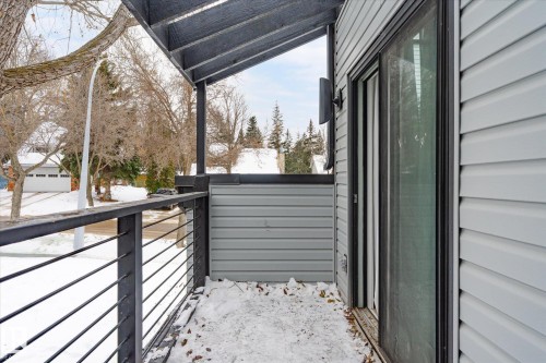 View of snow covered back of property - 38 Woodcrest Avenue, St. Albert, AB - Outdoor With Exterior
