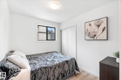 Bedroom featuring light wood-style floors and a closet - 