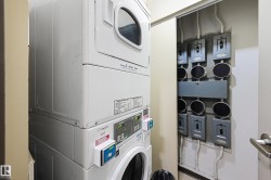 Laundry room featuring stacked washer / drying machine - 