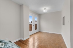 Spare room featuring baseboards - 