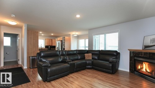 7514 40 Ave, Camrose, AB - Indoor Photo Showing Living Room With Fireplace