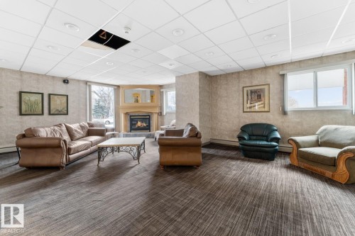 1504 10150 117 Street, Edmonton, AB - Indoor With Fireplace