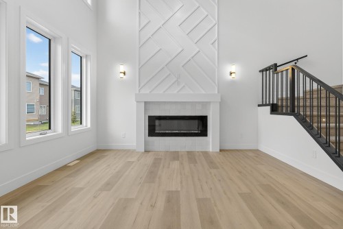 3306 Chickadee Drive, Edmonton, AB - Indoor Photo Showing Living Room With Fireplace