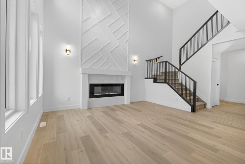 3306 Chickadee Drive, Edmonton, AB - Indoor Photo Showing Other Room With Fireplace