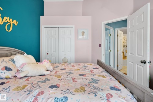 Bedroom featuring a closet - 24 Olmstead Court, St. Albert, AB - Indoor Photo Showing Bedroom