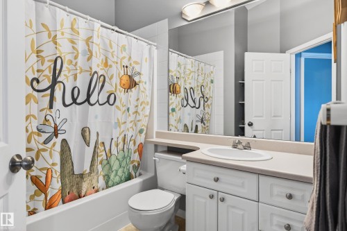 Full bathroom featuring vanity and shower / bath combo - 24 Olmstead Court, St. Albert, AB - Indoor Photo Showing Bathroom