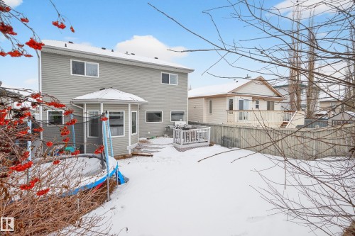 Snow covered house featuring a deck and a gazebo - 24 Olmstead Court, St. Albert, AB - Outdoor