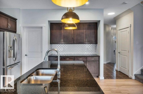 237 Sheppard Circle, Leduc, AB - Indoor Photo Showing Kitchen With Double Sink