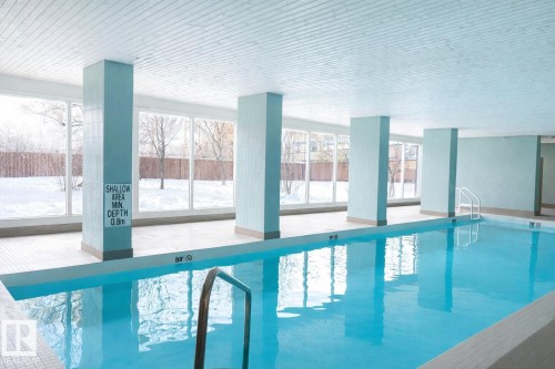1808 9909 104 Street, Edmonton, AB - Indoor Photo Showing Other Room With In Ground Pool