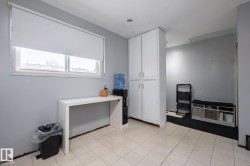 Home office featuring light floors - 