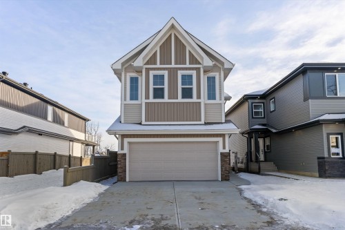 740 Astoria Way, Devon, AB - Outdoor With Facade