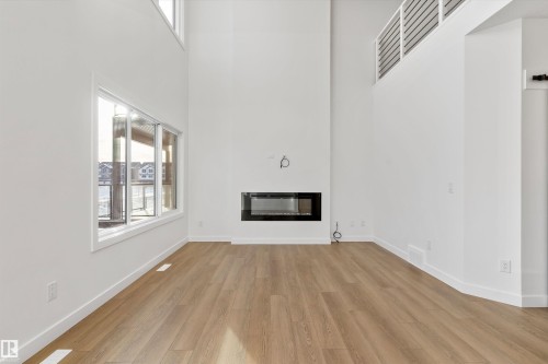 740 Astoria Way, Devon, AB - Indoor With Fireplace