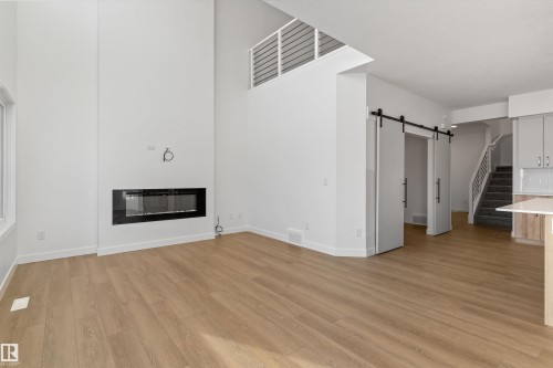 740 Astoria Way, Devon, AB - Indoor With Fireplace