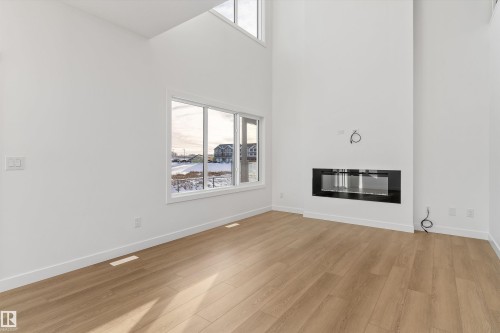 740 Astoria Way, Devon, AB - Indoor With Fireplace