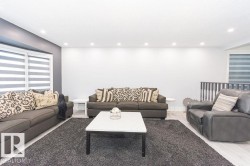 Living area featuring recessed lighting - 