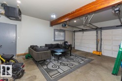 Garage featuring a garage door opener - 