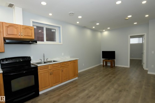 16316 65 Street, Edmonton, AB - Indoor Photo Showing Kitchen With Double Sink