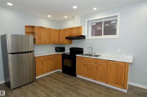 16316 65 Street, Edmonton, AB - Indoor Photo Showing Kitchen With Double Sink