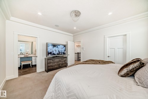 Bedroom featuring carpet floors, ornamental molding, and recessed lighting - 6 Wade Avenue, Leduc, AB - Indoor Photo Showing Bedroom