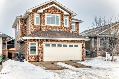Craftsman inspired home with stone siding and roof with shingles - 6 Wade Avenue, Leduc, AB - Outdoor With Facade