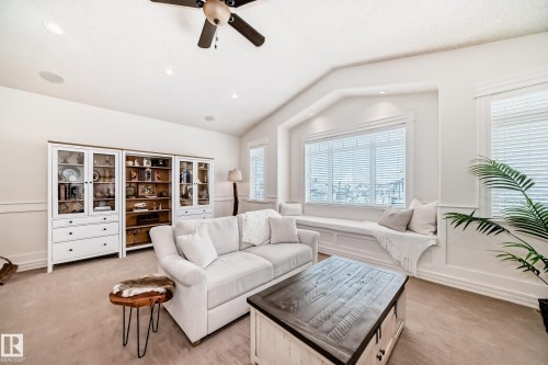 Living room featuring lofted ceiling, a ceiling fan, light carpet, and recessed lighting - 6 Wade Avenue, Leduc, AB - Indoor Photo Showing Living Room