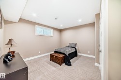 Bedroom featuring light carpet and recessed lighting - 